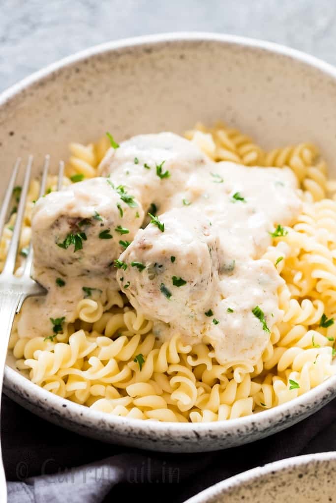 chicken meatballs in cream sauce is decadent chicken meatballs smothered with rich and delicious cream sauce poured over pasta