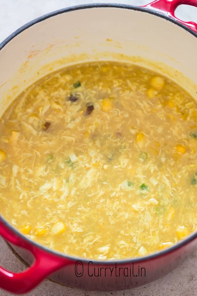 cooking egg drop soup in pot