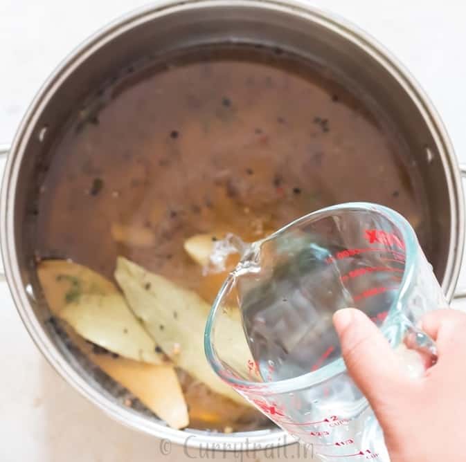 adding water to make brine for fried chicken.