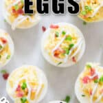 deviled eggs on white plate with text