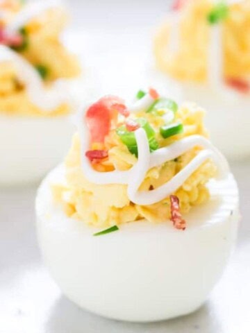 deviled eggs with bacon and chives.