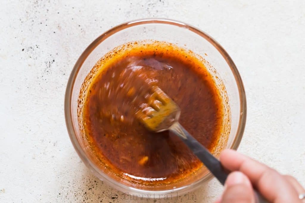 spice rub marinade for fish mixed in a small bowl.