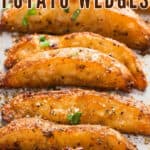 crispy baked potato wedges on baking tray with text