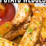 crispy baked potato wedges with tomato ketchup with text overlay