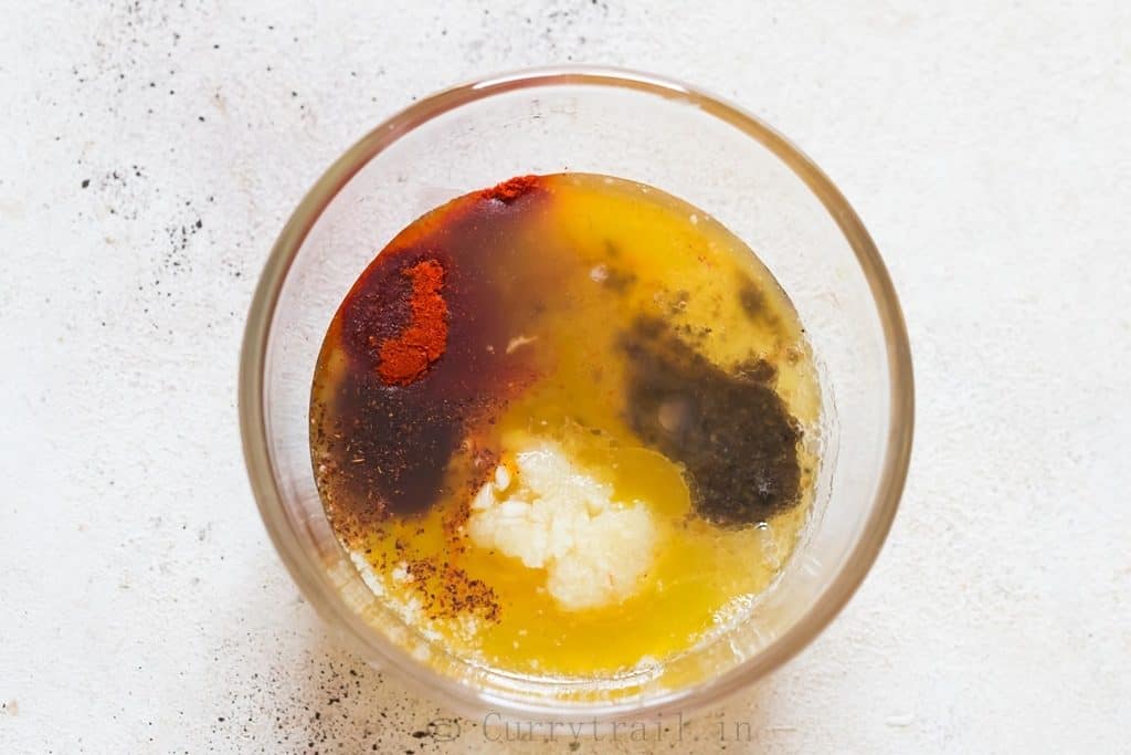 spice rub marinade for fish mixed in a small bowl.