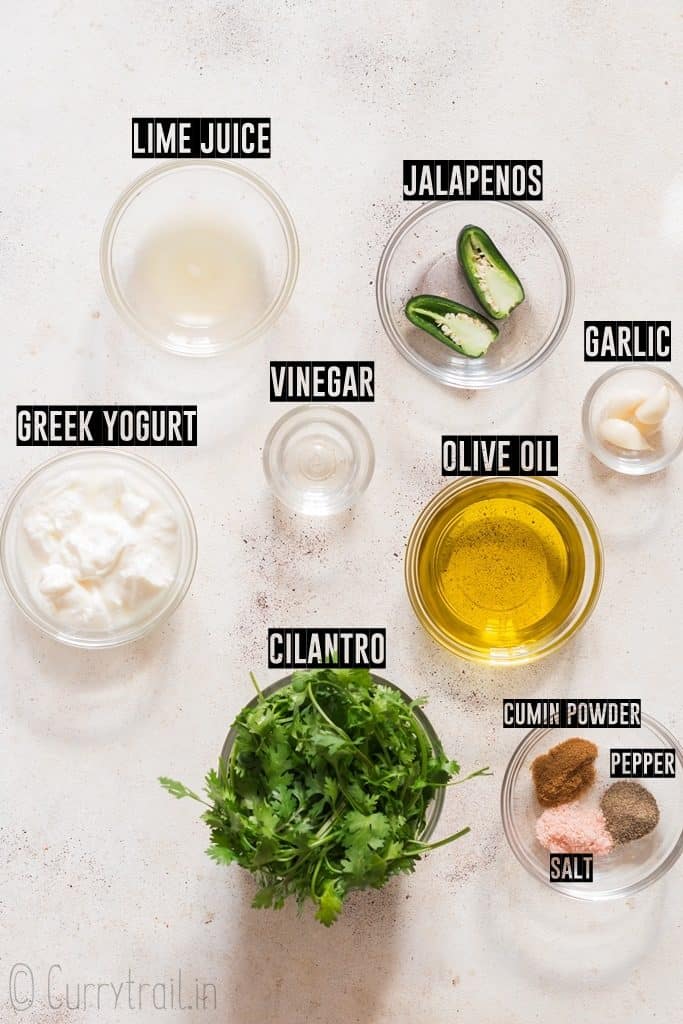all ingredients for cilantro sauce recipe in small glass bowls