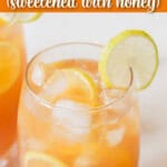 iced tea with lemon and honey served in two glasses.