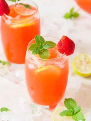 fresh strawberry lemonade served in 2 glasses