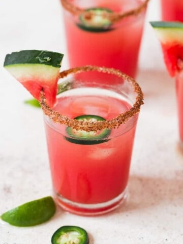 spicy watermelon margarita with sliced jalapenos