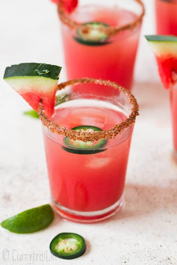 spicy watermelon margarita with sliced jalapenos