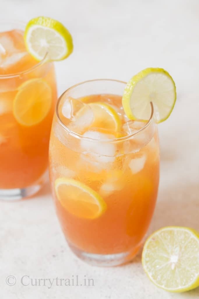 summer cool sweet lemon iced tea recipe served with lemon slices