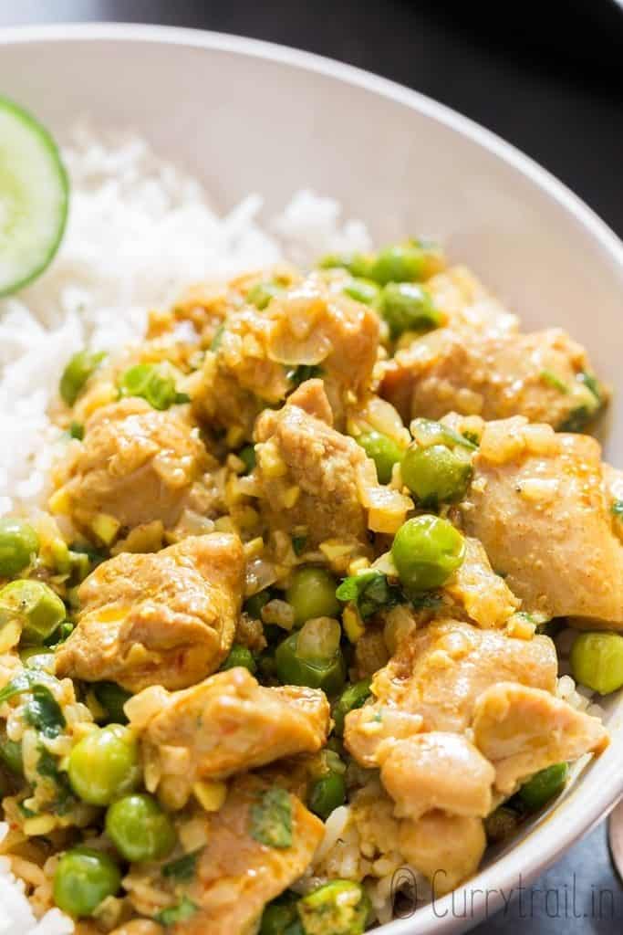 quick and easy chicken curry served over rice in a bowl
