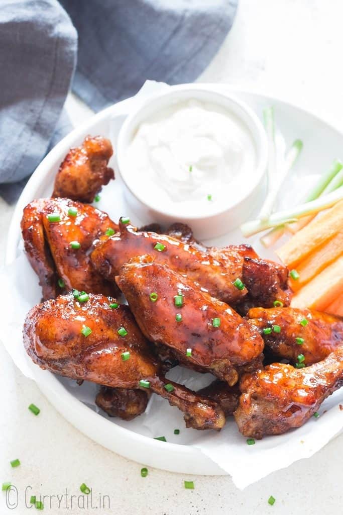 tender instant pot chicken wings with dipping sauce on side