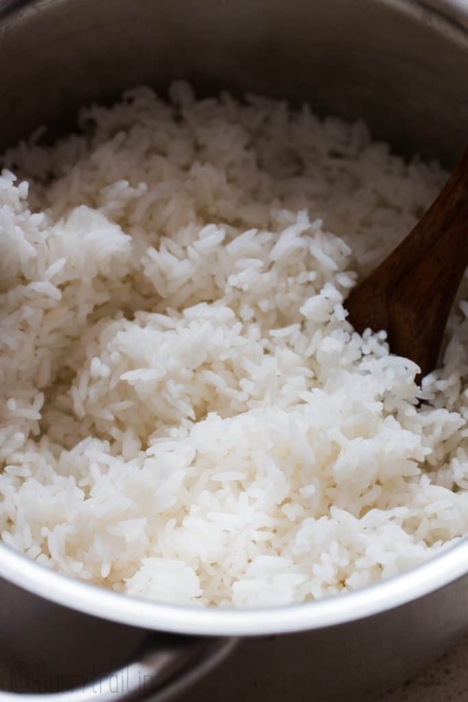 tender steamed rice in cooking pot