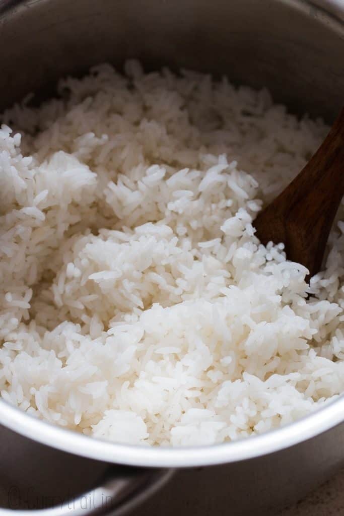 https://www.currytrail.in/wp-content/uploads/2019/07/Fluffy-steamed-rice-683x1024.jpg