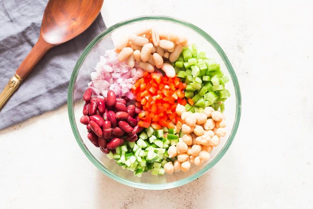 all salad ingredients for 3 bean salad in a bowl