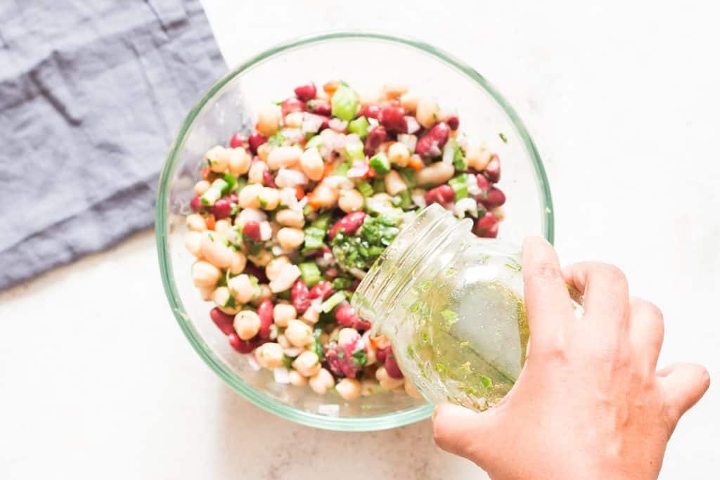 dressing for 3 beans salad poured over salad