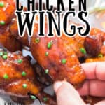 most succulent chicken wings cooked in instant pot served with sour cream on plate with text