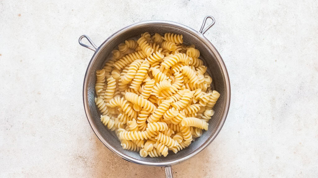 al-dente cooked fusilli pasta.