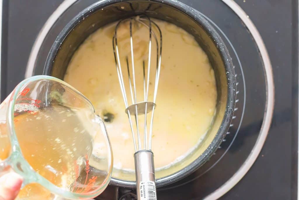 adding chicken stock for Parmesan sauce