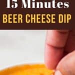 beer cheese dip made in 15 minutes served with pretzels in a white bowl with text overlay