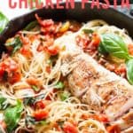 bruschetta chicken pasta in cast iron pan with napkin with text overlay