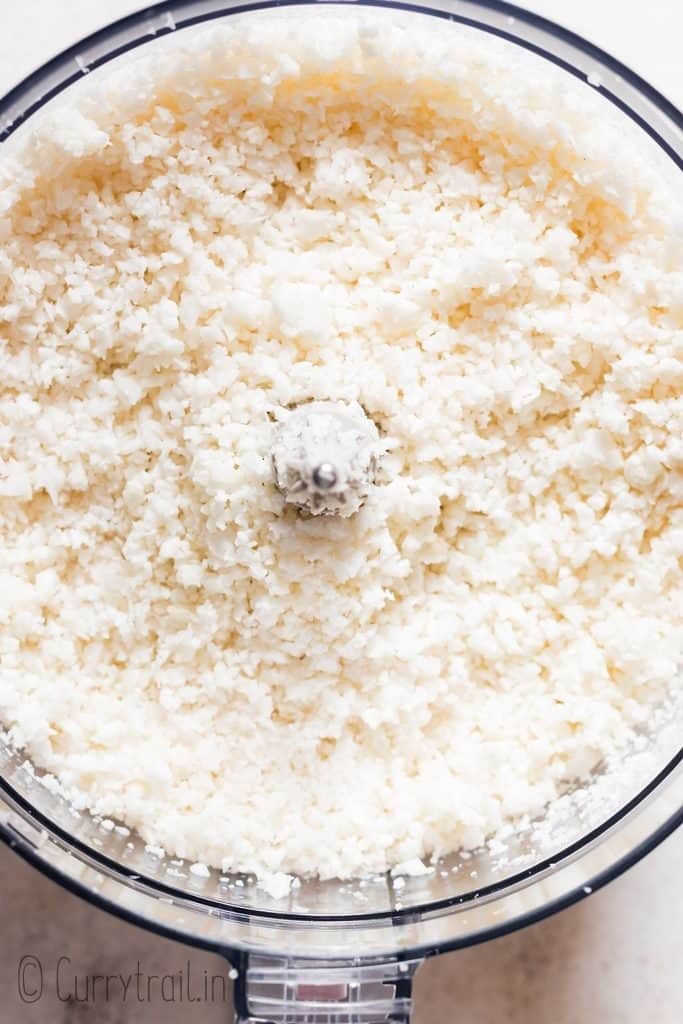 cauliflower florets pulsed into cauliflower rice in food processor