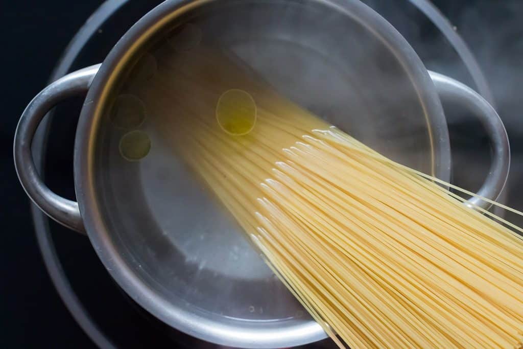 cooking pasta in salted boiling water