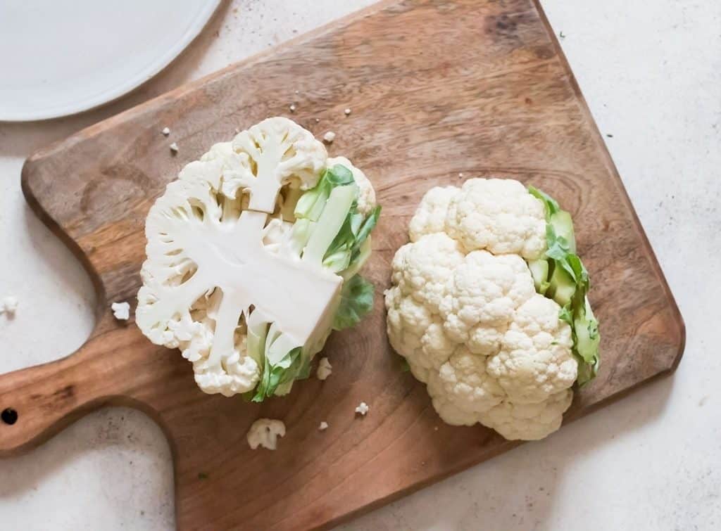 cut cauliflower into half to make cauliflower rice