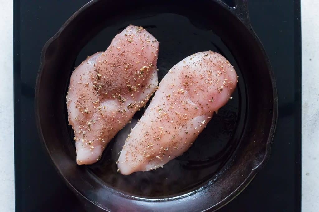 sear chicken breasts on cast iron pan
