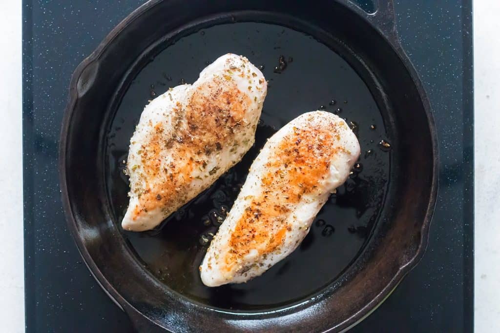 sear chicken breasts on cast iron pan