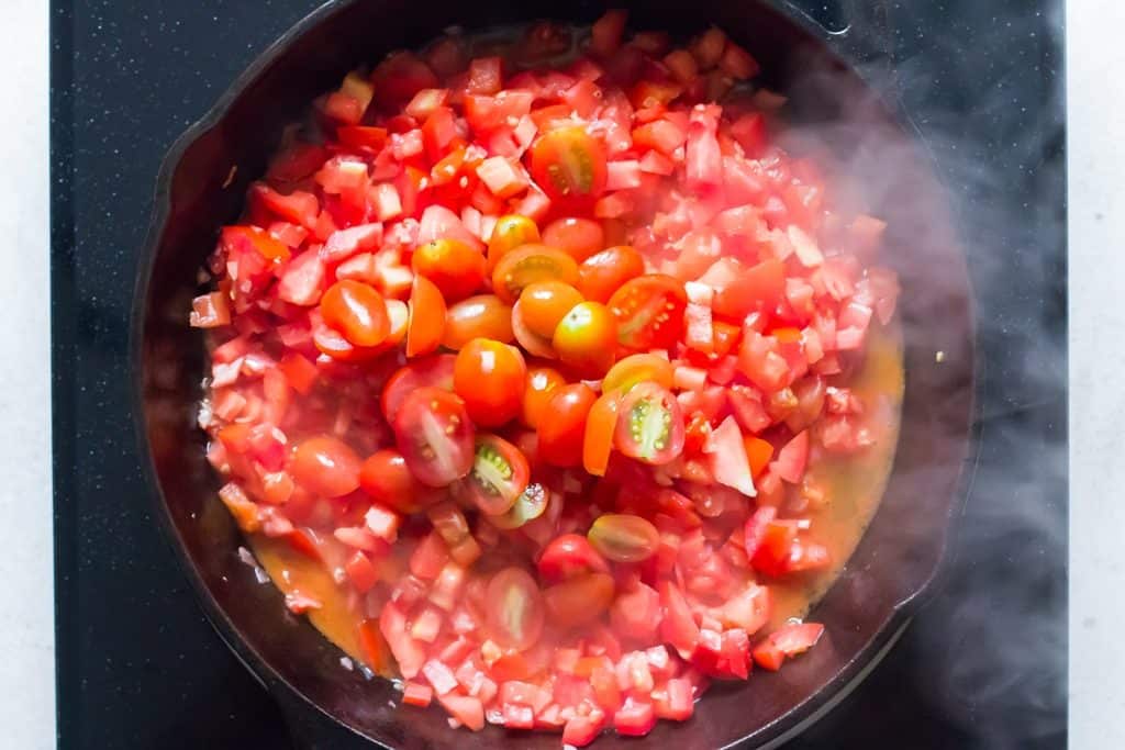 cooking roma tomatoes in cast iron skillet