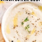 cream of cauliflower soup in white ceramic bowl with text