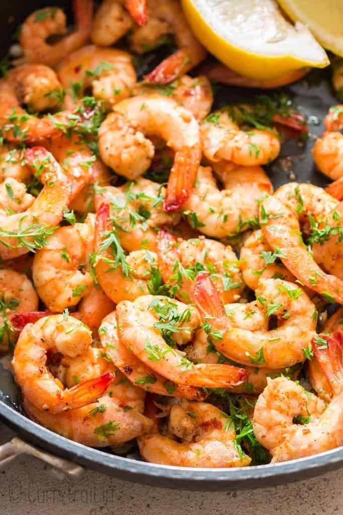 garlic butter shrimp cooked in skillet