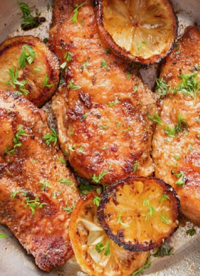3 lemon pepper chicken breasts in a skillet.