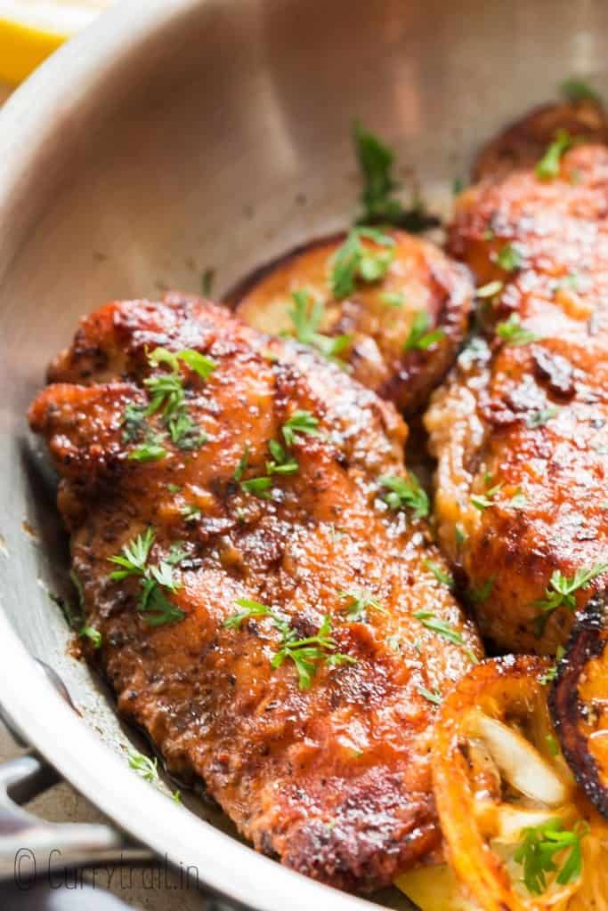 lemon pepper chicken cooked in skillet