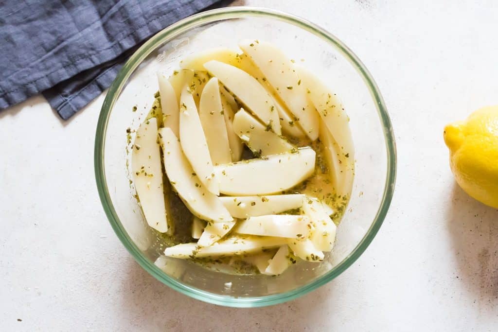 potato wedges in garlic lemony chicken broth