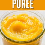 homemade pumpkin puree in glass jars with text