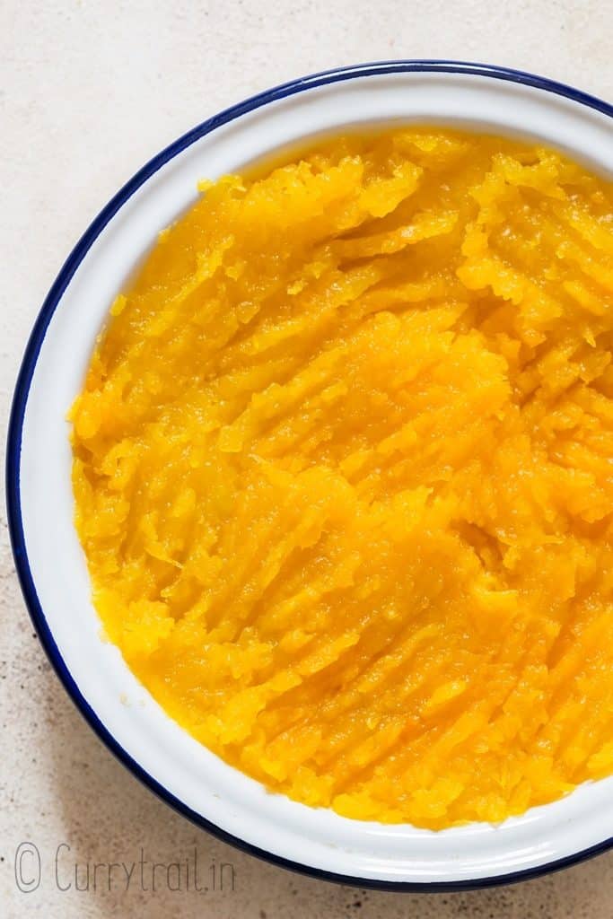 roasted and mashed pumpkin puree in white plate