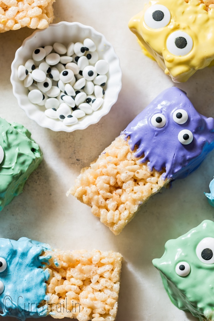 monster halloween rice krispie treats placed randomly on board