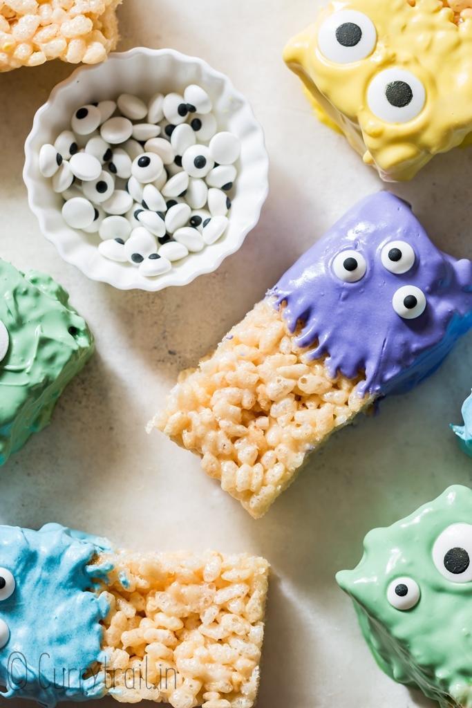 monster halloween rice krispie treats placed randomly on board