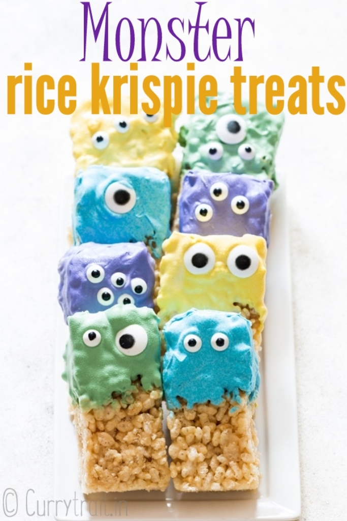 monster eye halloween rice krispie treats arranged on white plate