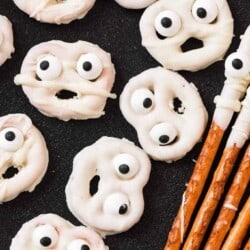 ghost halloween pretzels on black plate