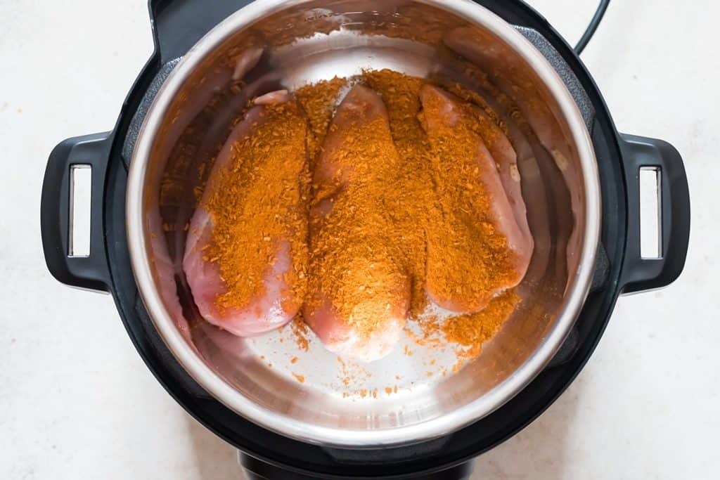 taco seasoning over chicken breasts