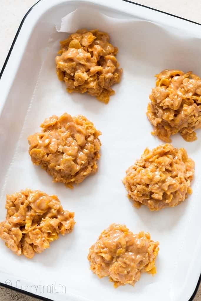 cornflake cookies arranged on white tray