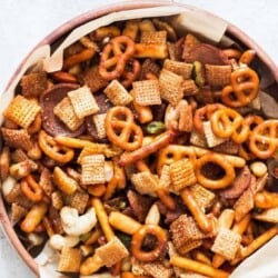 sweet and spicy chex mix in wooden bowl
