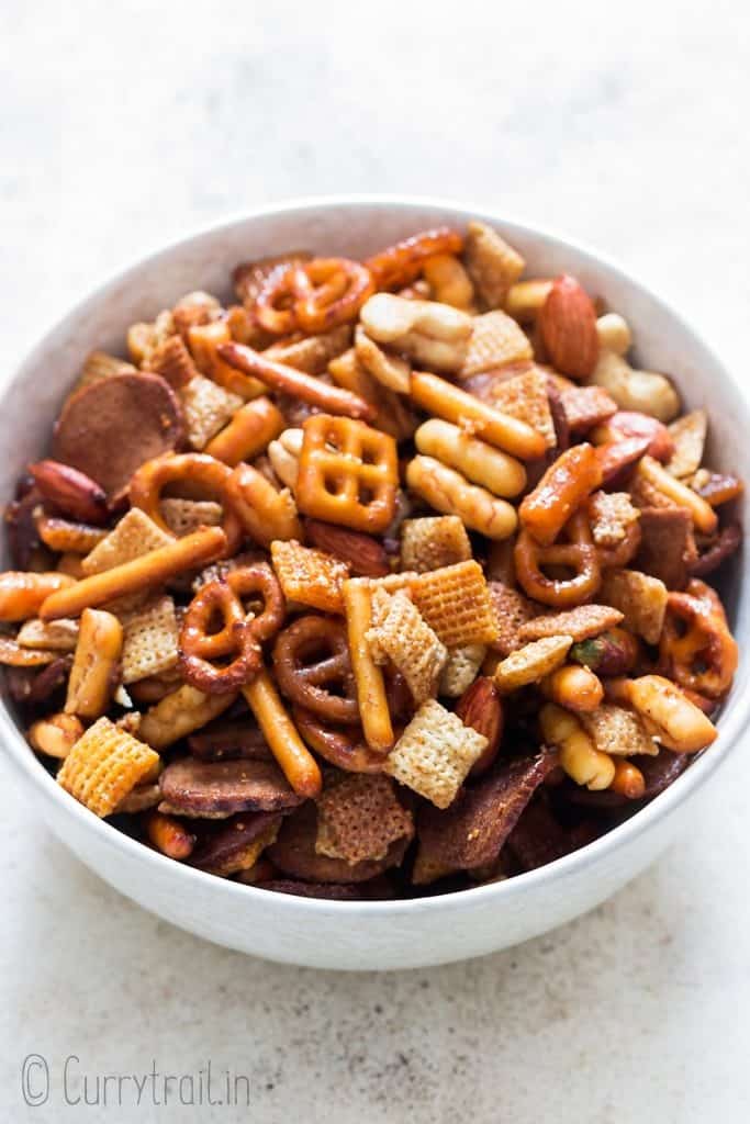sweet and spicy chex mix in white bowl