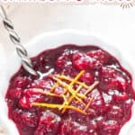 honey sweetened instant pot cranberry sauce in bowl with orange peels with text