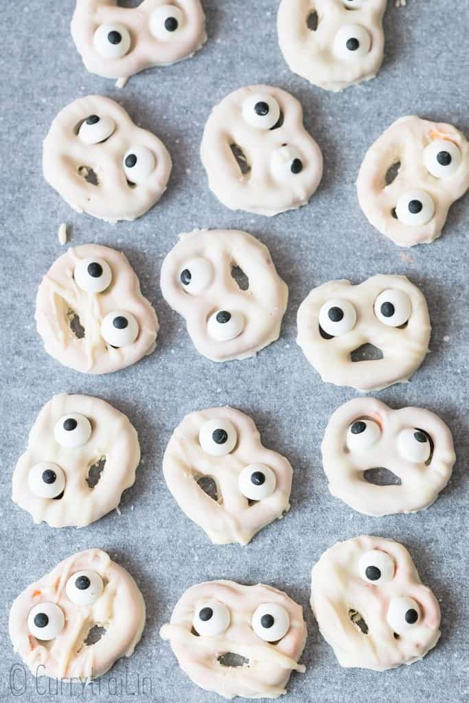 ghosts pretzels on parchment paper