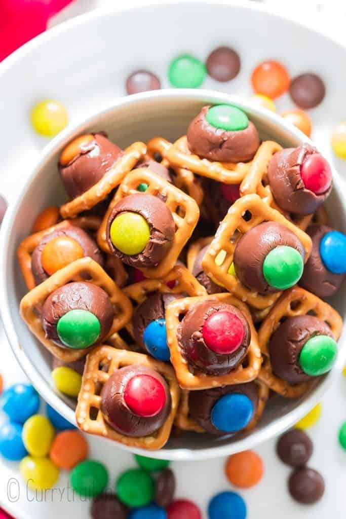 pretzel chocolate with M&M candies in white bowl